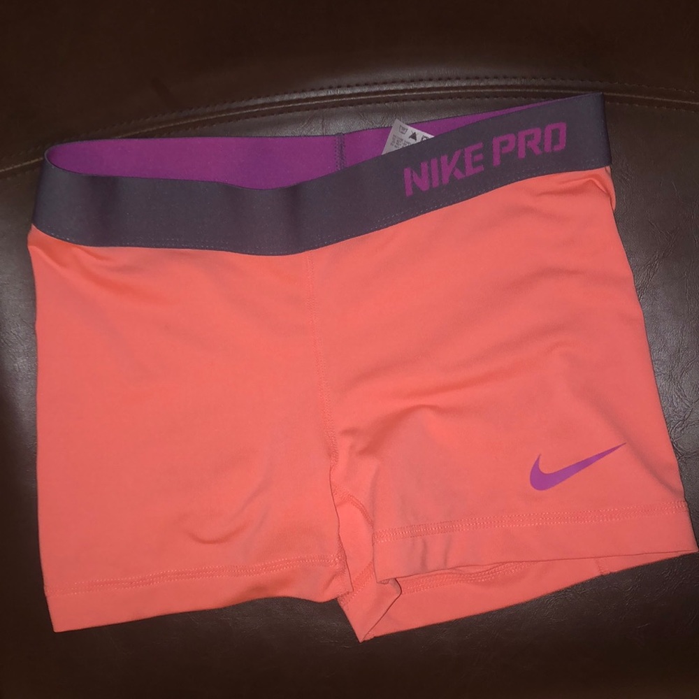 Orange Nike pro spandex bike shorts